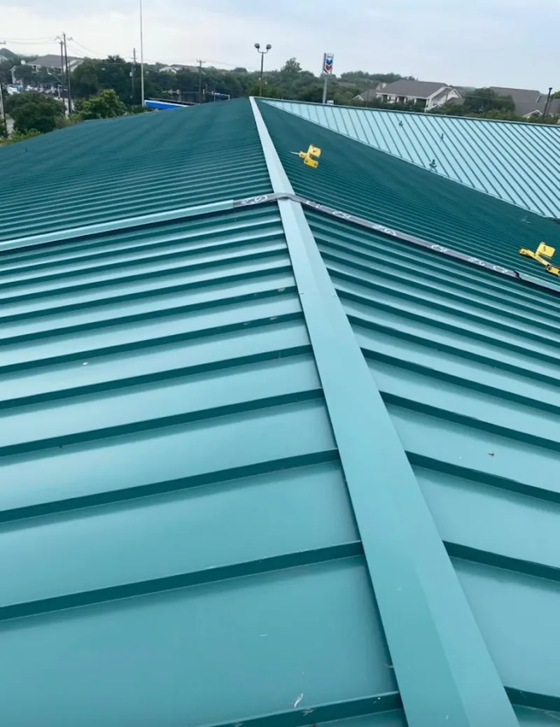 Green commercial metal roof ridge and valley for Metal Roof Repair in Lower Makefield
